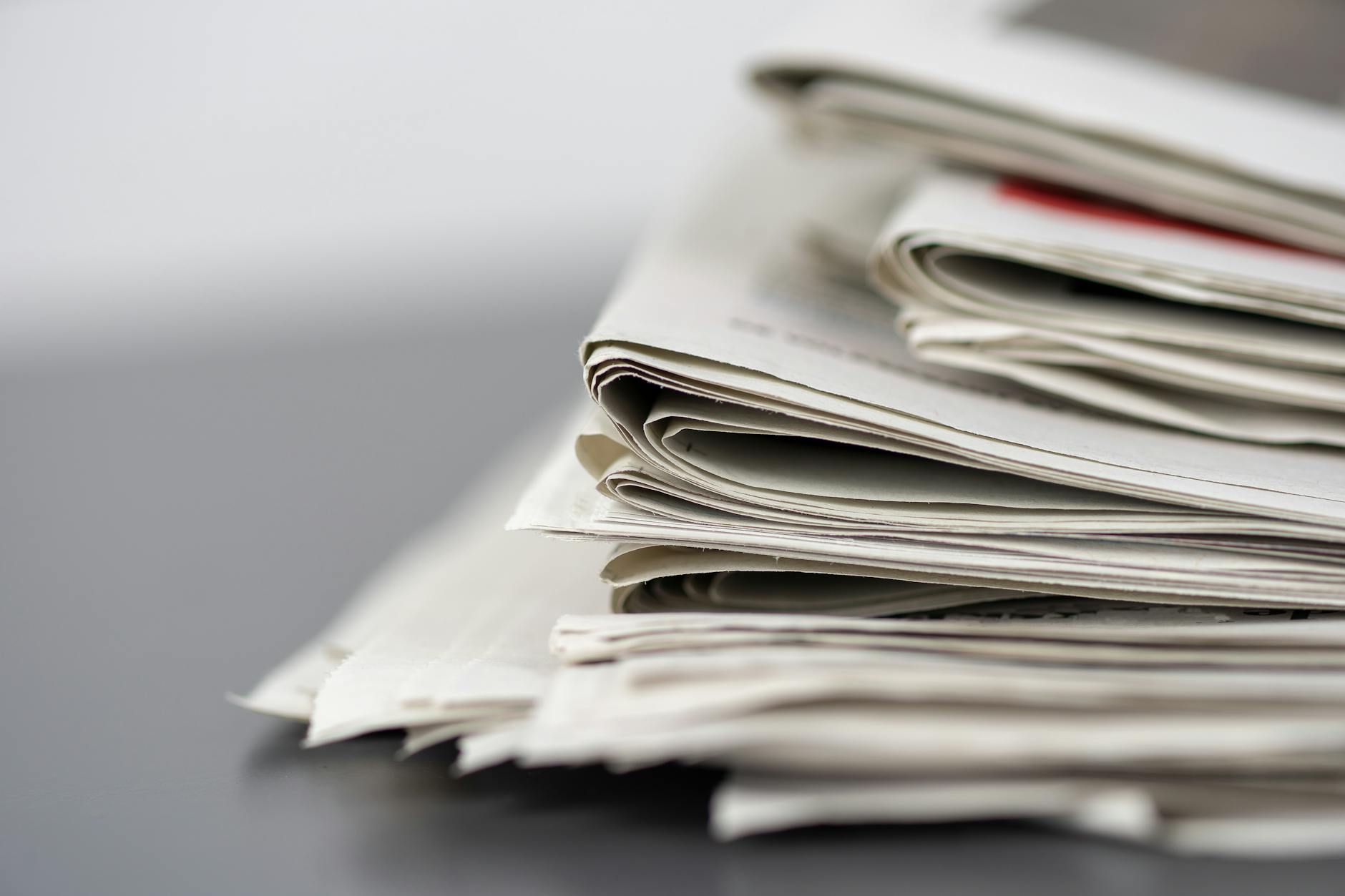 folded newspapers
