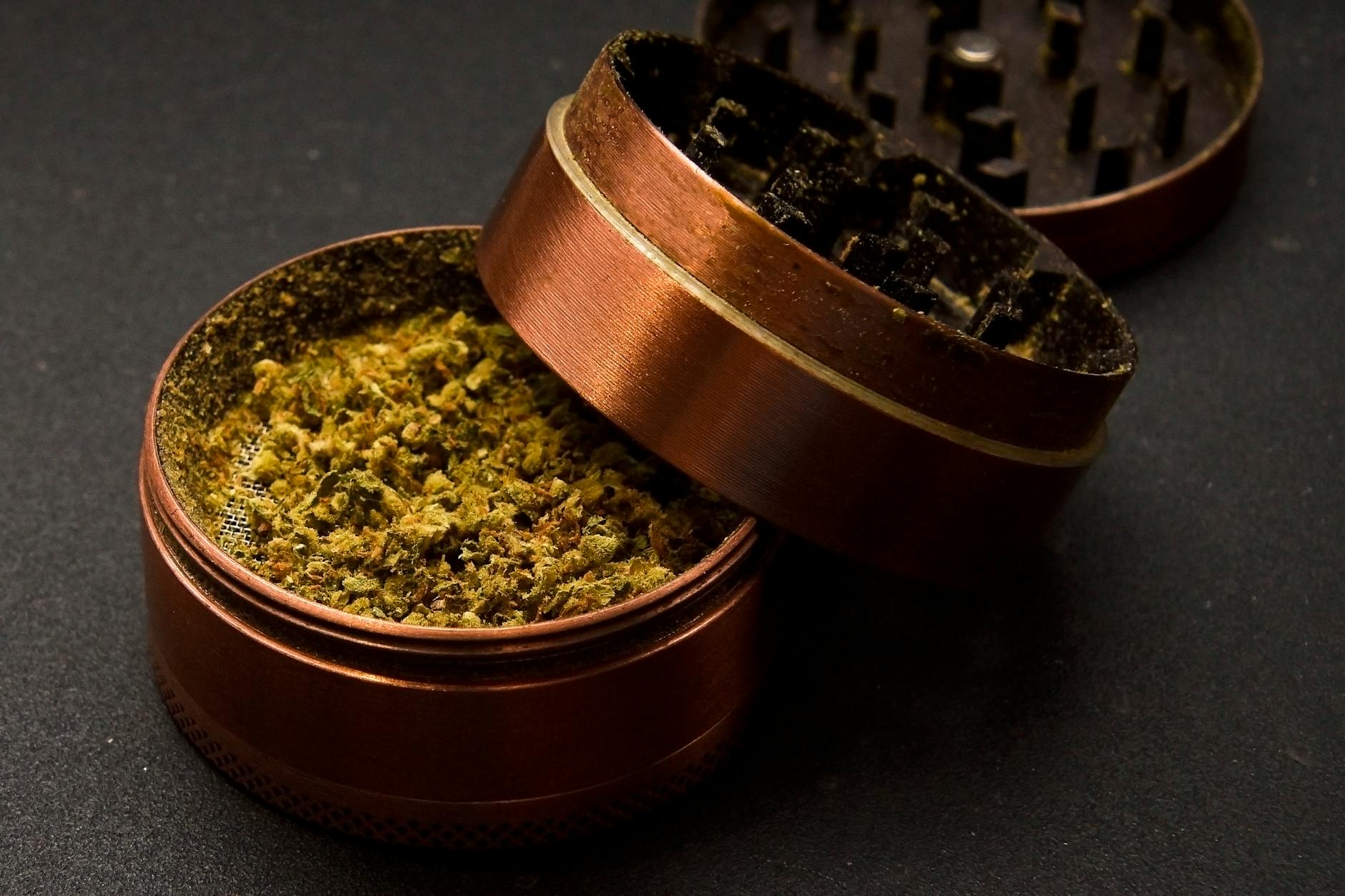 Dried herbs in copper bowl representing traditional Chinese herbal medicine formulas